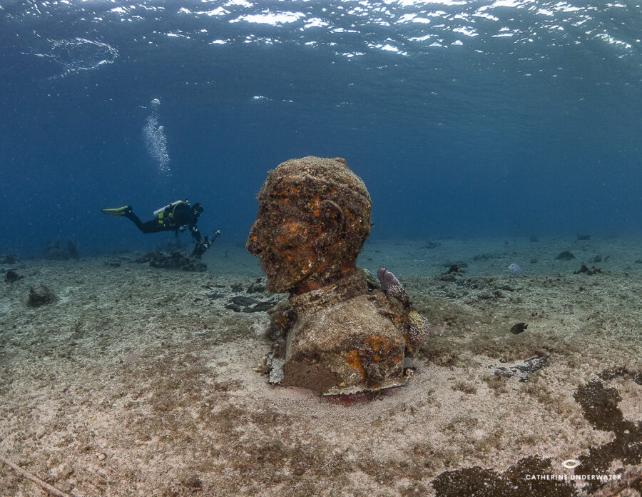Sculpture of Jacques Costeau underwater at Sand Dollar Sports