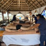 Men getting a massage at Del Mar Spa at Sand Dollar Sports