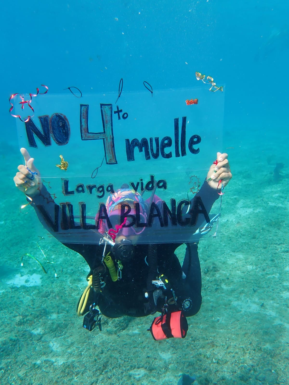 underwater protest on Villa Blanca Reef