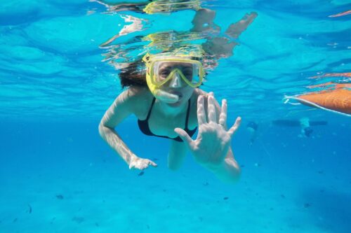 Snorkeler in water shore snorkel tour
